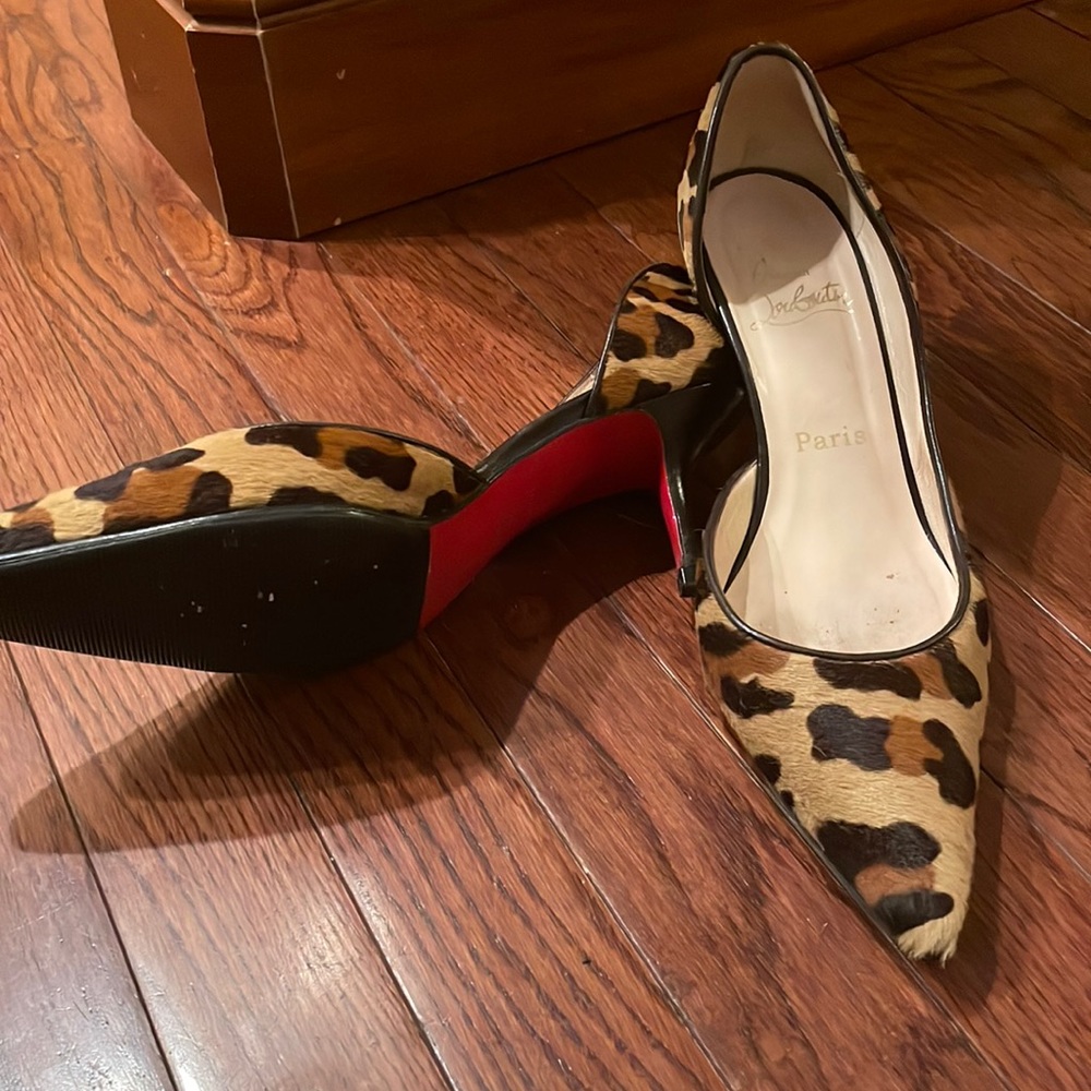 Christian Louboutin pony leopard heels.